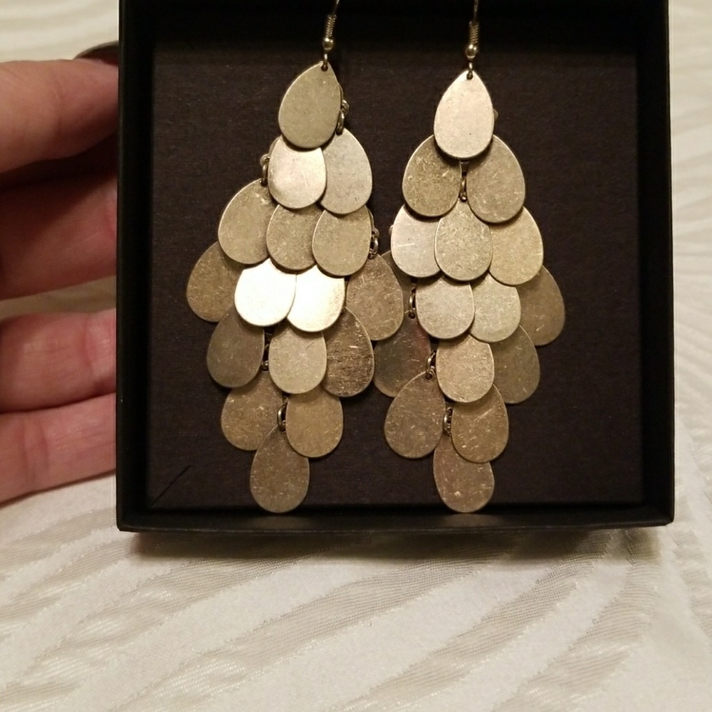Gold dangling party earrings